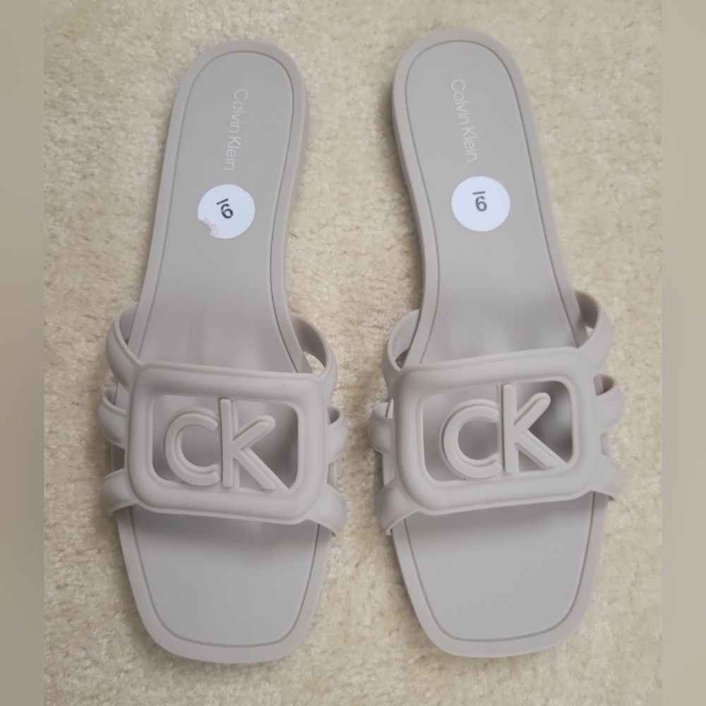 CK SLIDE SANDALS / WOMEN